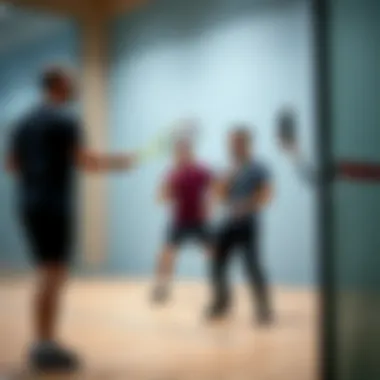 Squash Coaching in Action Coaching session taking place in a squash court, emphasizing skill development