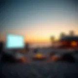 Beach Cinema Setup at Dusk A scenic view of a beach cinema setup with a large screen and cozy seating arrangements