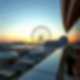 A panoramic view of the Dubai Wheel against the sunset backdrop